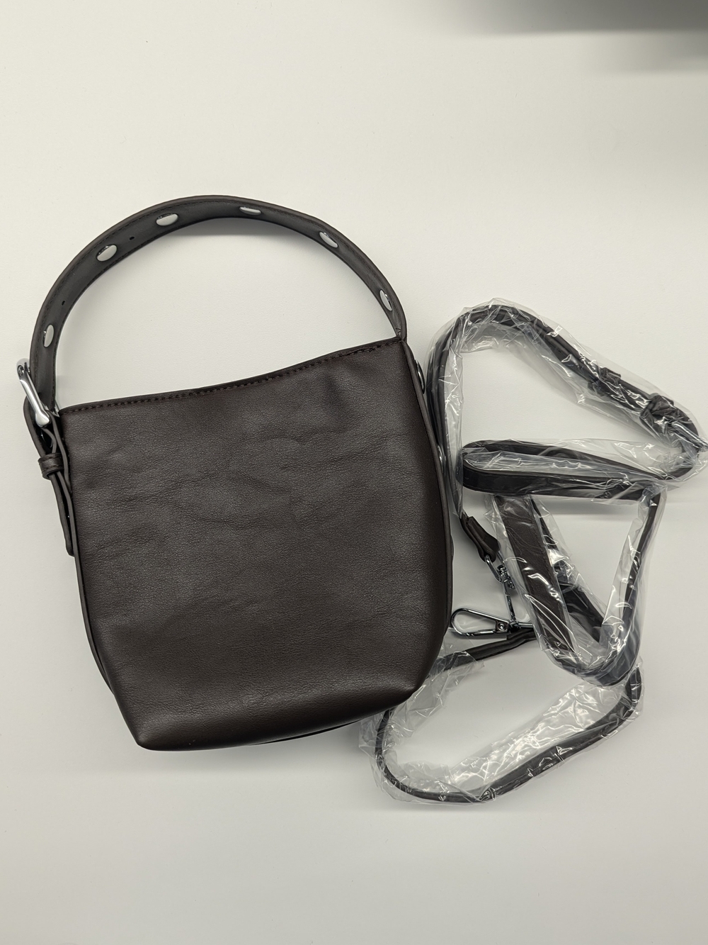 Madison West Hand Carry Or Crossbody Bag in Brown